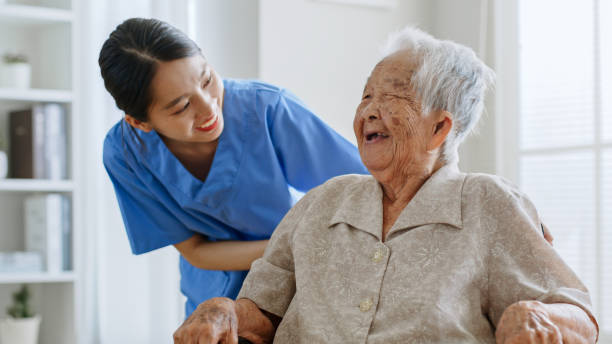Cura Wound Care provider gently treating a patient's wound in a home setting